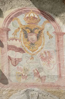 Italy, Trentino Alto Adige, Glorenza, wall painting with Austrian flag on medieval gate Italy, Trentino Alto Adige, Glorenza, wall painting with Austrian flag on medieval gate