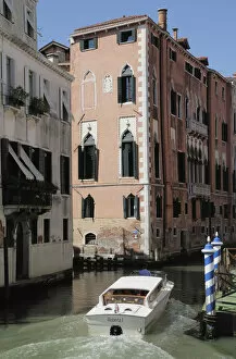 Italy, Veneto, Venice, canal scene with taxi boat