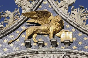 Italy, Veneto, Venice, Gold Lion of St Mark, Basilica San Marco facade Italy, Veneto, Venice, Gold Lion of St Mark, Basilica San Marco facade
