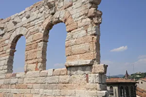 Italy, Veneto, Verona, Arena arches with city skyline Italy, Veneto, Verona, Arena arches with city skyline