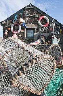 Lobster pots outside a fisherman's house on the isle of Easdale Lobster pots outside a fisherman's house on the isle of Easdale