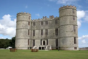 Lulworth Castle with tables and chairs on lawns outside Lulworth Castle with tables and chairs on lawns outside