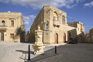 Malta, Gozo, Gharb, old town with stone fountain Malta, Gozo, Gharb, old town with stone fountain