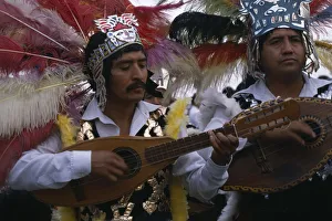 MEXICO, Mexico City Musicians wearing elaborate feather head-dresses MEXICO, Mexico City Musicians wearing elaborate feather head-dresses