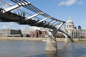 The Millennium bridge spans the river Thames between the Tate Modern art gallery The Millennium bridge spans the river Thames between the Tate Modern art gallery