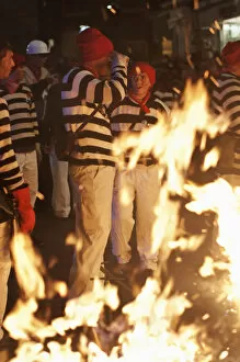 Participants in the annual bonfire night parade held in Lewes, East Sussex