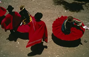PERU Puno Lake Titicaca Aymara Andean Indian dancers wearing red skirts