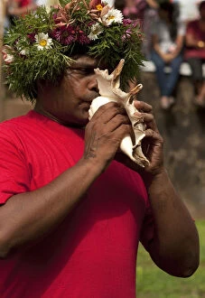PORTRAIT OF A MAN BLOWING A CONCH SHELL AT THE SAN JAO FESTIVAL CELEBRATIONS, SIOLIM, GOA