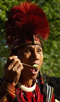 PORTRAIT OF A TRIBAL WEARING THE TRADITIONAL COSTUME OF A NAGA WARRIOR TRIBE, NAGALAND PORTRAIT OF A TRIBAL WEARING THE TRADITIONAL COSTUME OF A NAGA WARRIOR TRIBE, NAGALAND