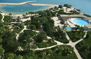 Qatar, Doha, Aerial view over the Sheraton Hotel swimming pool and beach Qatar, Doha, Aerial view over the Sheraton Hotel swimming pool and beach
