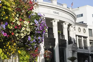 Rodeo Drive. Flower basket & shops Two Rodeo shopping alley Rodeo Drive. Flower basket & shops Two Rodeo shopping alley