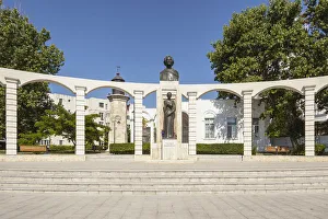 Romania, Constanta, Statue of Mihai Eminescu, and the Genoese lighthouse Romania, Constanta, Statue of Mihai Eminescu, and the Genoese lighthouse