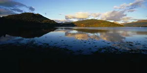 Scotland, Highlands, Loch Shira, View across Loch Shira in evening light with mountains reflected in the water towards Scotland, Highlands, Loch Shira, View across Loch Shira in evening light with mountains reflected in the water towards