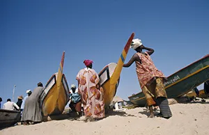 Related Images Gallery: SENEGAL, Soumbedioune Women wearing brightly coloured traditionally patterned clothing
