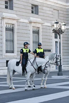 Spain, Madrid, Mounted policemen outside the Palacio Real Spain, Madrid, Mounted policemen outside the Palacio Real