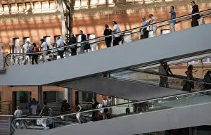 Spain, Madrid, Passengers using the escalators inside the terminus of the Atocha Railway