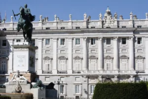 Spain, Madrid, Statue of Philip IV to the left with the Palacio Real in the background Spain, Madrid, Statue of Philip IV to the left with the Palacio Real in the background
