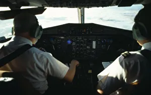 Transport, Air, Cockpit, Pilots on flightdeck during flight Transport, Air, Cockpit, Pilots on flightdeck during flight