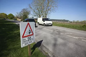 Images Dated 18th July 2014: Transport, Road, Cars, resurfaced road with sign warning of reduced speed limit