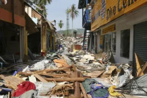 Tsunami. Phi Phi on the 11th day after the tsunami hit Shattered shops and restaurants with 2 feet of debris covering
