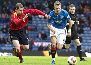 Football Action Scottish Cup Collection: A Battle of Champions: Dean Shiels vs. Alan Reid in the Scottish Cup Quarterfinal at Ibrox Stadium