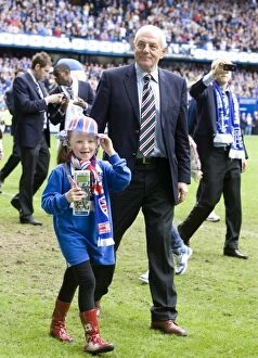 Football Celebrations Collection: Champion Celebrations: Walter Smith and Granddaughter Jessica at Ibrox Stadium - Rangers SPL