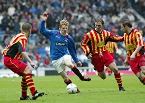 Partick Thistle Collection: Chris Burke's Stunning Goal (2-0) Secures Rangers Victory over Partick Thistle