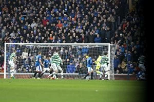 Soccer Football Action Old Firm Derby Glasgow Collection: Dramatic Ibrox Rivalry: Moussa Dembele Scores for Celtic Against Rangers