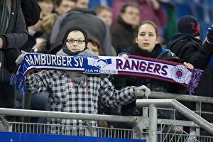 Football Action Friendly Collection: Hamburg's Triumph: Tense 2-1 Rivalry Over Rangers at Imtech Arena