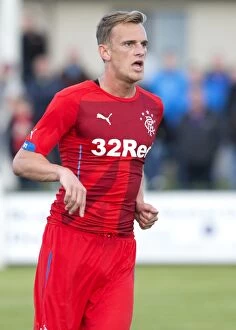Football Action Pre Season Friendly Collection: Rangers Dean Shiels: Scottish Cup Champion in Form at Victoria Park - Pre-Season Victory Against