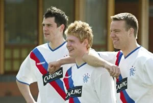 Steven Thompson Collection: Rangers FC: Chris Burke, Gavin Rae, and Steven Thompson in New Away Kit