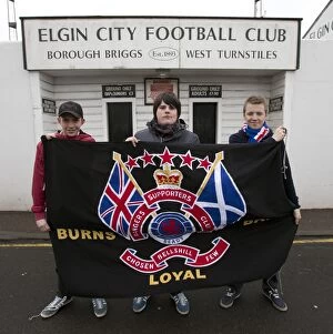 Football Action Fans Flag Collection: Rangers Football Club: Ecstatic Fans Celebrate Dominant 6-2 Victory over Elgin City