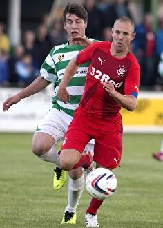Football Action Pre Season Friendly Collection: Rangers Kenny Miller: In Action During Rangers vs. Buckie Thistle (Scottish Cup Winning Moment)