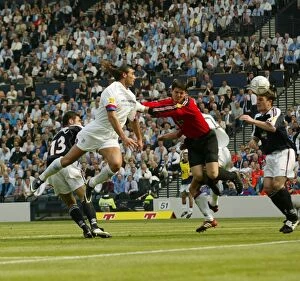 Lorenzo Amoruso Collection: Rangers Lorenzo Amoruso Scores the Dramatic Winning Goal Against Dundee (31/05/03)