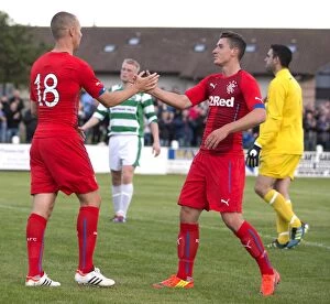 Football Action Pre Season Friendly Collection: Rangers: Miller and Aird Celebrate Goal in Pre-Season Victory over Buckie Thistle