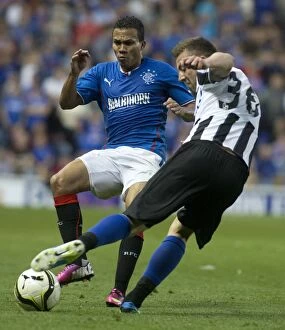 Football Action Friendly Collection: Rangers vs Newcastle United: A Thrilling 1-1 Draw at Ibrox Stadium - Peralta vs Dummett