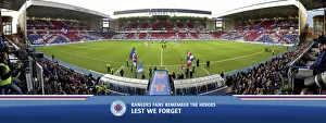<b class=qtipBold><figcaption>Rememberance Panoramic</figcaption></b><br>On Saturday 10 November 2012 in a packed Ibrox stadium Rangers & Peterhead fans remembered the fallen heroes. 20% of the retail value of this print will be donated to Poppy Scotland RANG600 - Large RANG601 - Desktop Rememberance Panoramic