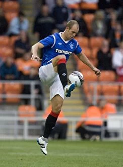 Football Action Friendly Collection: Steven Whittaker Scores the Second Goal: Rangers 2-0 Pre-Season Victory over Blackpool at
