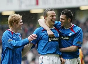 Steven Thompson Collection: Unforgettable: Rangers Clinch Scottish Premiership Title with 2-0 Victory over Partick Thistle
