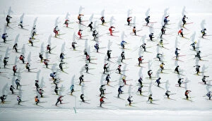 An aerial view of cross country skiers racing over the frozen lake Sils during the