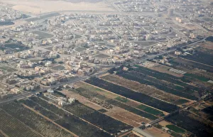 An aerial view of new housing complexes in a suburb of Cairo is pictured through the An aerial view of new housing complexes in a suburb of Cairo is pictured through the