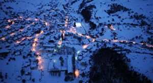 An aerial view of the small eastern city of Kalinovik covered by snow during winter at
