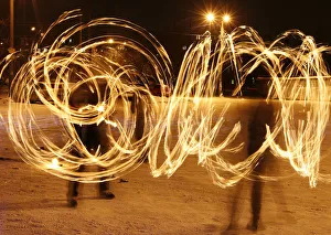 Amateur artists perform a fire show to celebrate the Chinese Lunar New Year in Russia's Amateur artists perform a fire show to celebrate the Chinese Lunar New Year in Russia's