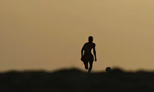 Angolan youths play soccer on the beach in the capital Luanda Angolan youths play soccer on the beach in the capital Luanda