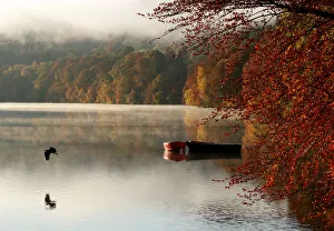Autumnal foliage is reflected on Loch Faskally, Pitlochry, Scotland Autumnal foliage is reflected on Loch Faskally, Pitlochry, Scotland