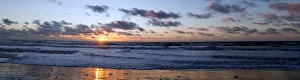 A beachfront along the Atlantic Ocean coast is pictured at sunset in Montalivet-les-Bains A beachfront along the Atlantic Ocean coast is pictured at sunset in Montalivet-les-Bains