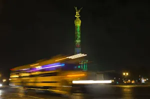 The Berlin Victory Column is illuminated during the Festival of Light show in Berlin The Berlin Victory Column is illuminated during the Festival of Light show in Berlin