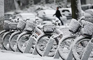 Bicycles are covered in snow following heavy snowfall in the western German city of Bicycles are covered in snow following heavy snowfall in the western German city of
