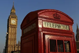 Big Ben is seen behind a red telephone box, in central London Big Ben is seen behind a red telephone box, in central London