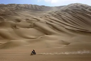 A biker competes during the 11th stage of the fourth South American edition of the A biker competes during the 11th stage of the fourth South American edition of the